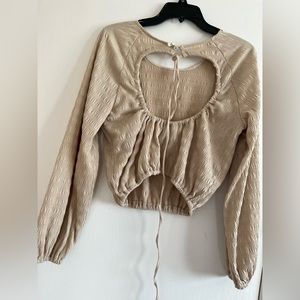 cream color shirt /the pants are a Large and the shirt is a medium